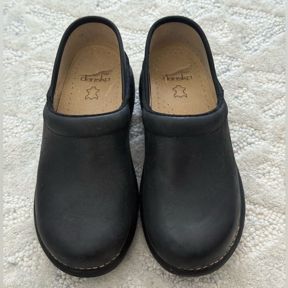 Dansko Black Leather Slip-On Clogs